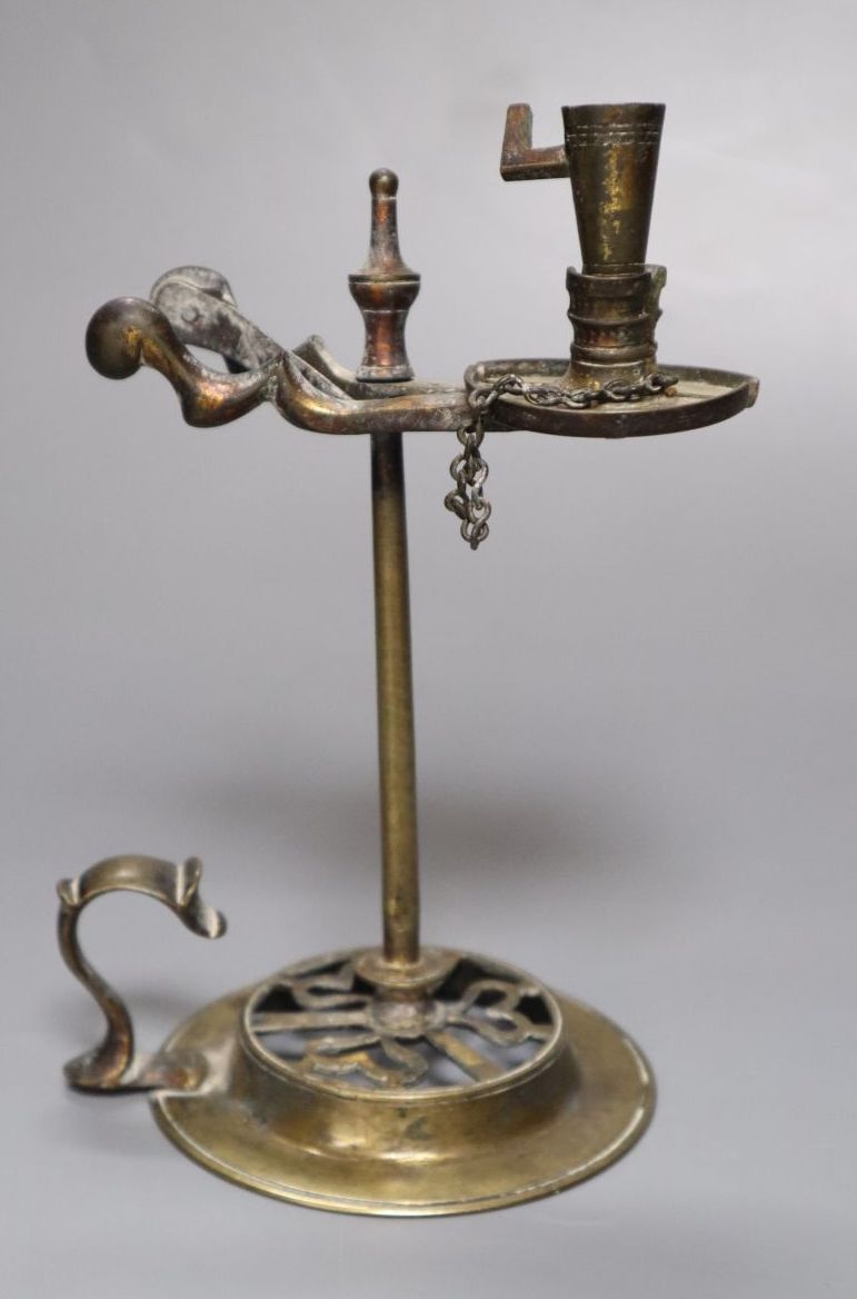 A 19th century brass waxjack, with attached extinguisher, 14cm high